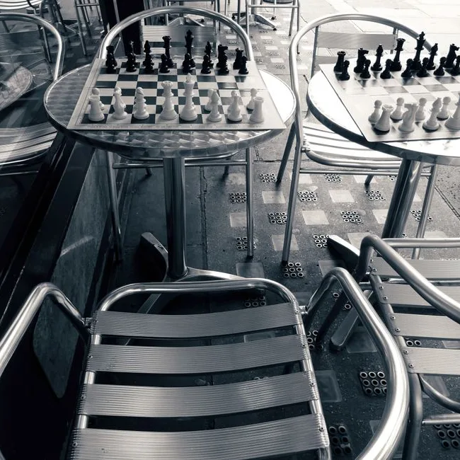 Chess tables set up and waiting for players